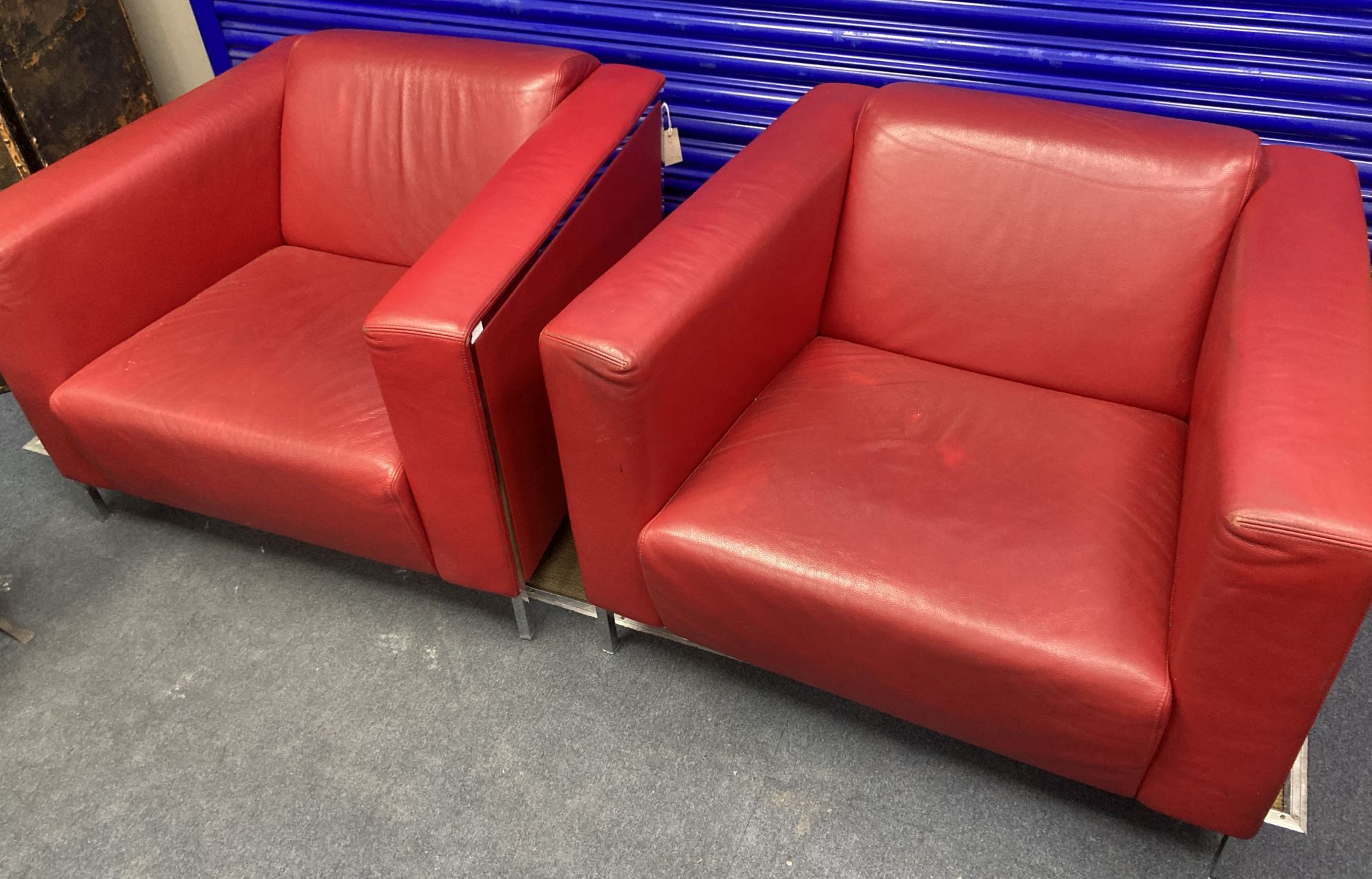 A pair of Italian mid-century armchairs by Moruso, width 94cm, depth 83cm, height 64cm